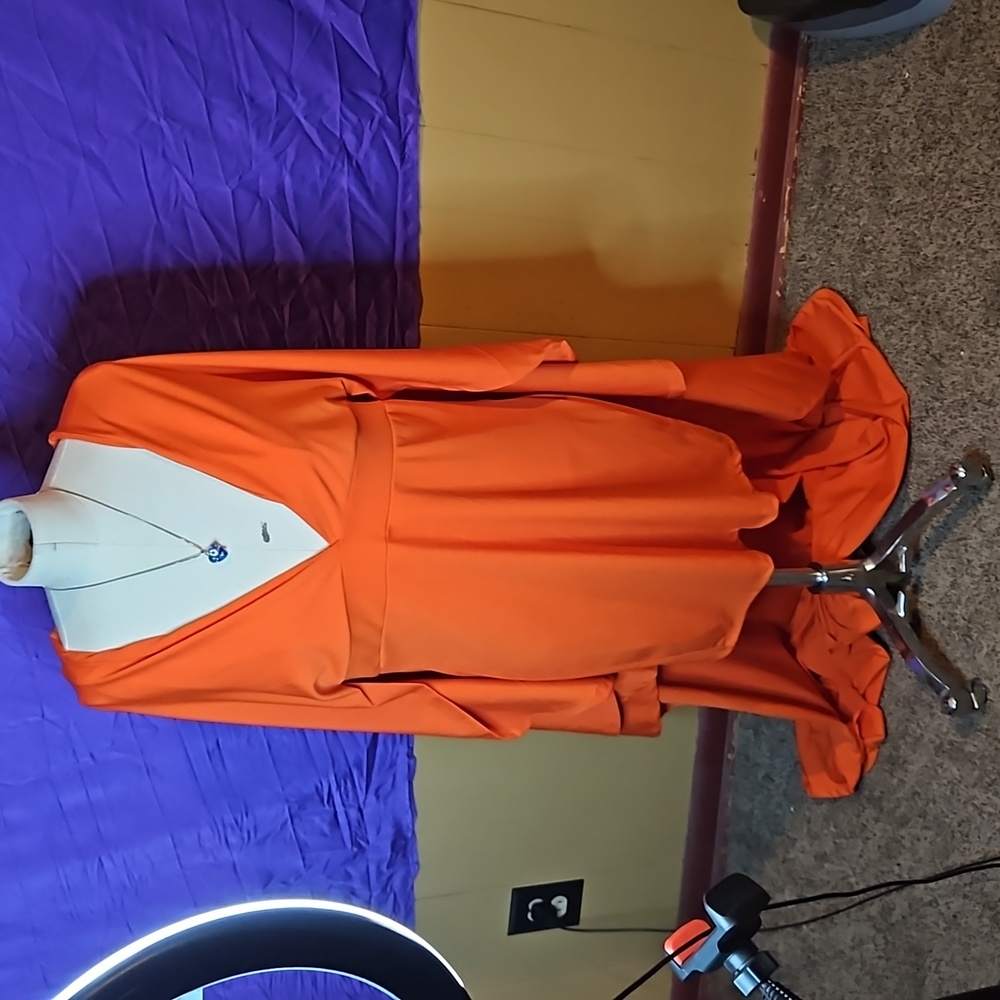 Caped orange party dress